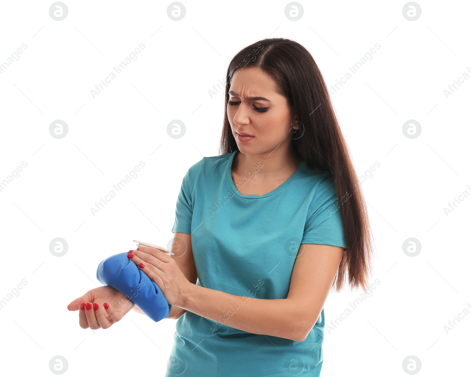 Photo of Woman with cold compress suffering from wrist pain on white background