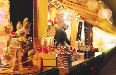 Photo of Decorated Christmas fair stall with different treats