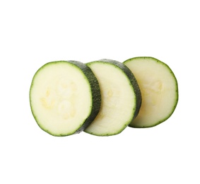 Photo of Slices of ripe zucchini on white background, top view