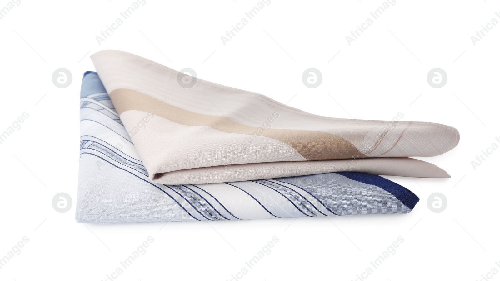 Photo of Folded handkerchiefs on white background. Stylish accessory
