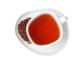 Photo of Ceramic cup of aromatic rooibos tea isolated on white, top view