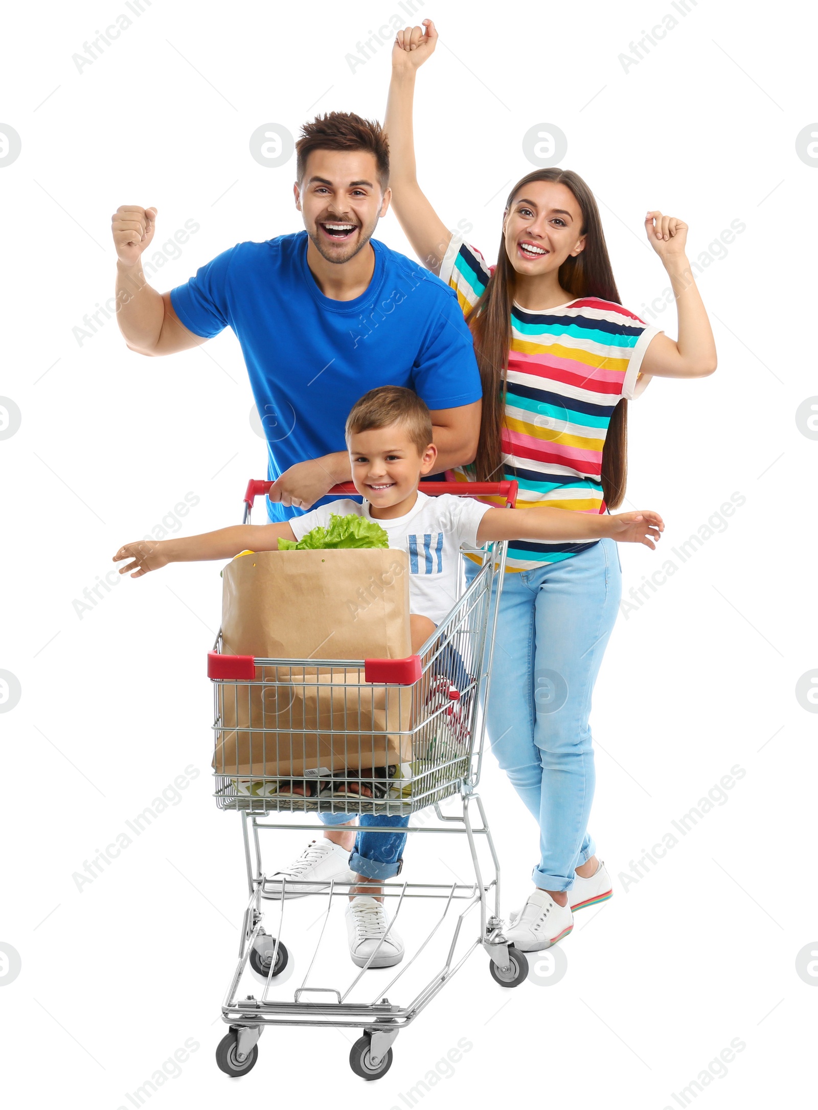 Photo of Happy family with shopping cart on white background