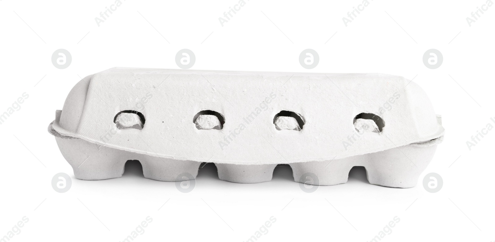 Photo of Closed egg carton isolated on white. Package design