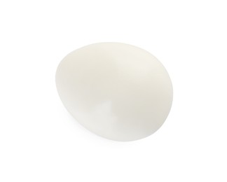 Peeled boiled quail egg on white background, top view