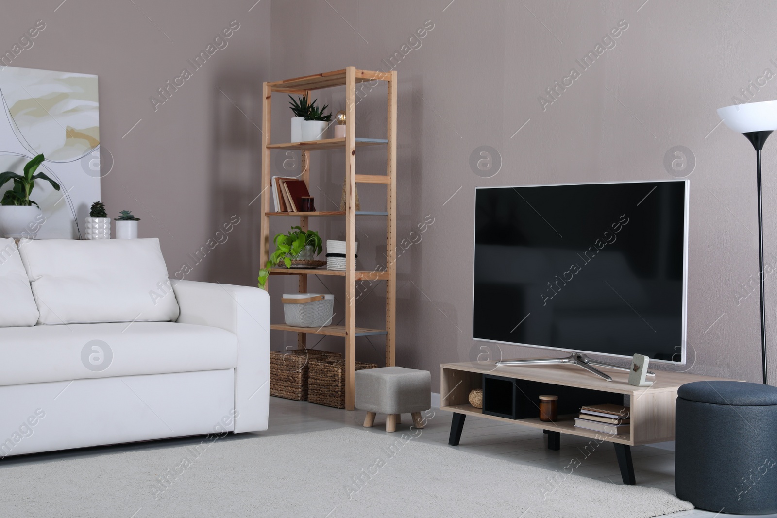 Photo of Living room interior with modern TV on stand