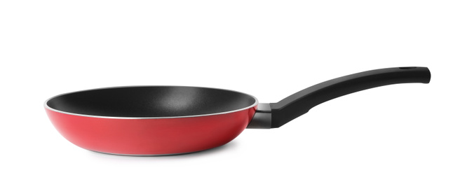 Modern red frying pan isolated on white