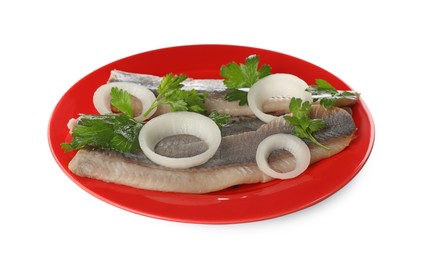 Photo of Red plate with delicious salted herring fillets, onion rings and parsley isolated on white