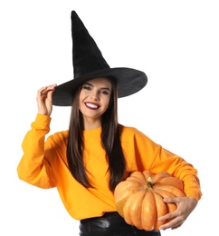 Photo of Beautiful woman wearing witch costume with pumpkin for Halloween party on white background