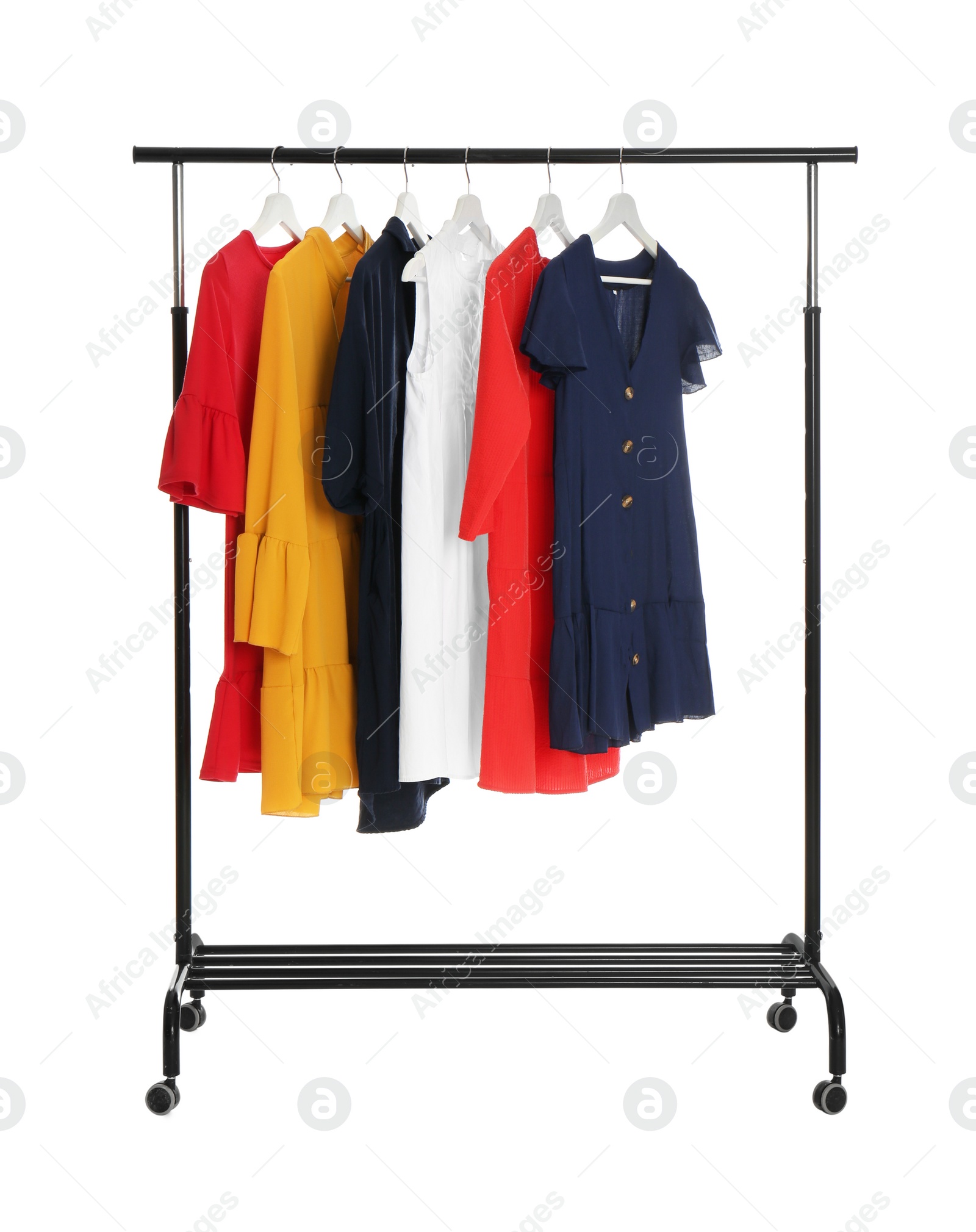 Photo of Rack with stylish women's clothes isolated on white