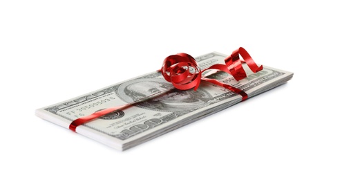 Photo of Stack of dollar banknotes with ribbon on white background