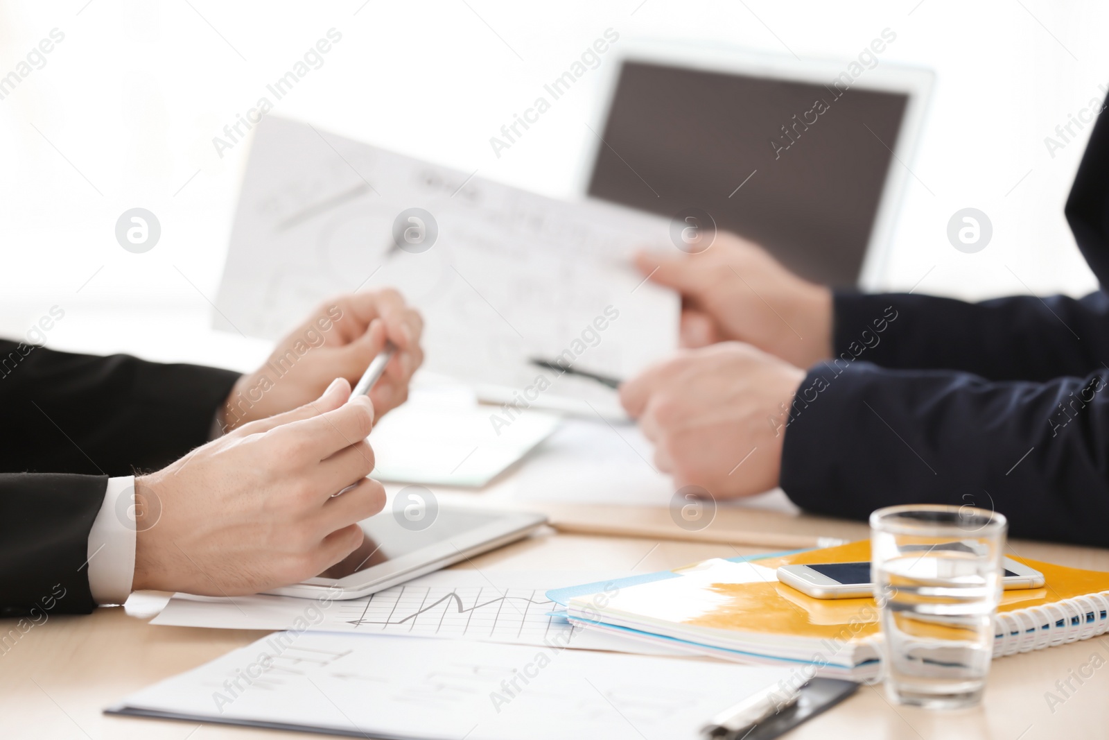 Photo of Business trainer and client working in office, closeup