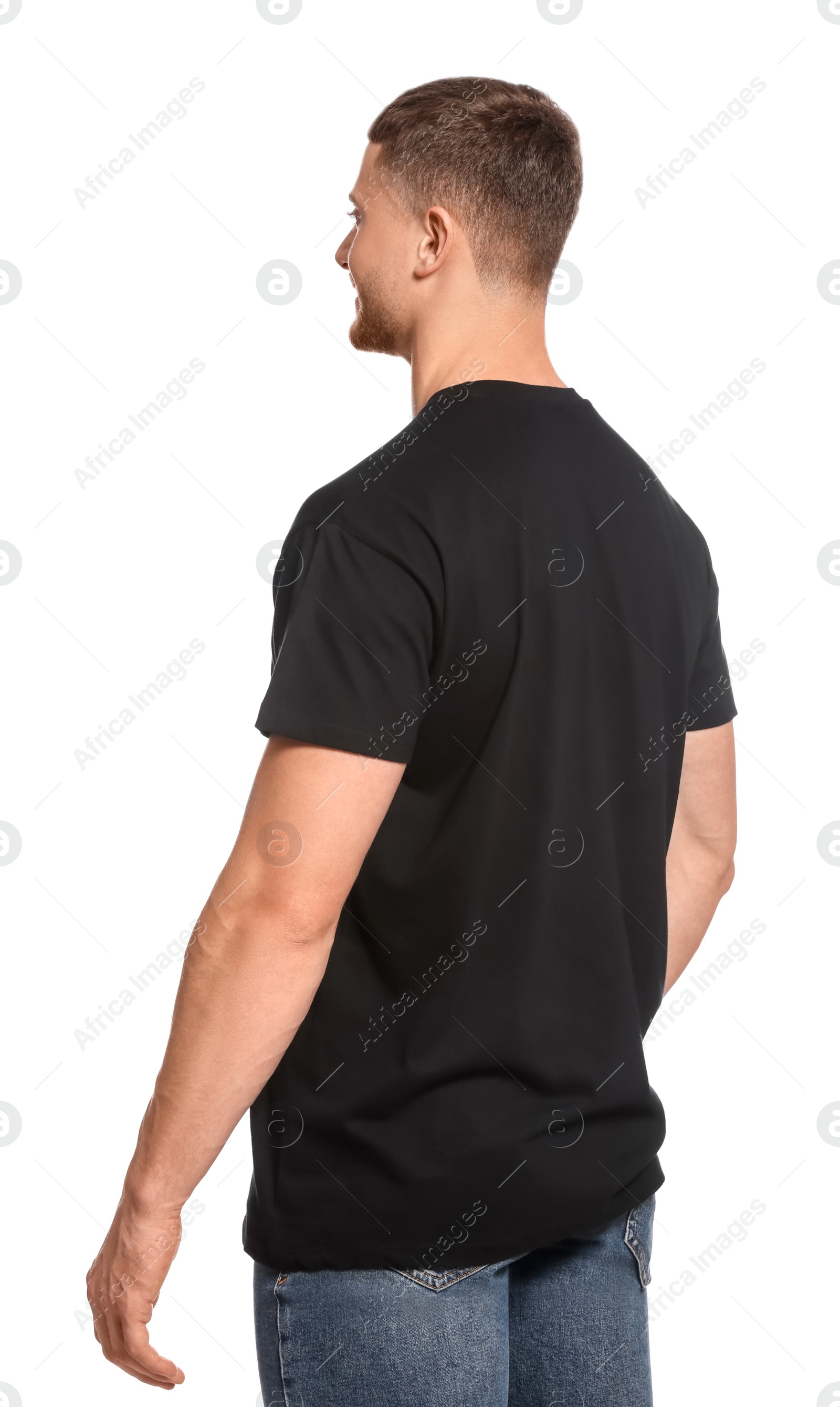 Photo of Man wearing black t-shirt on white background. Mockup for design