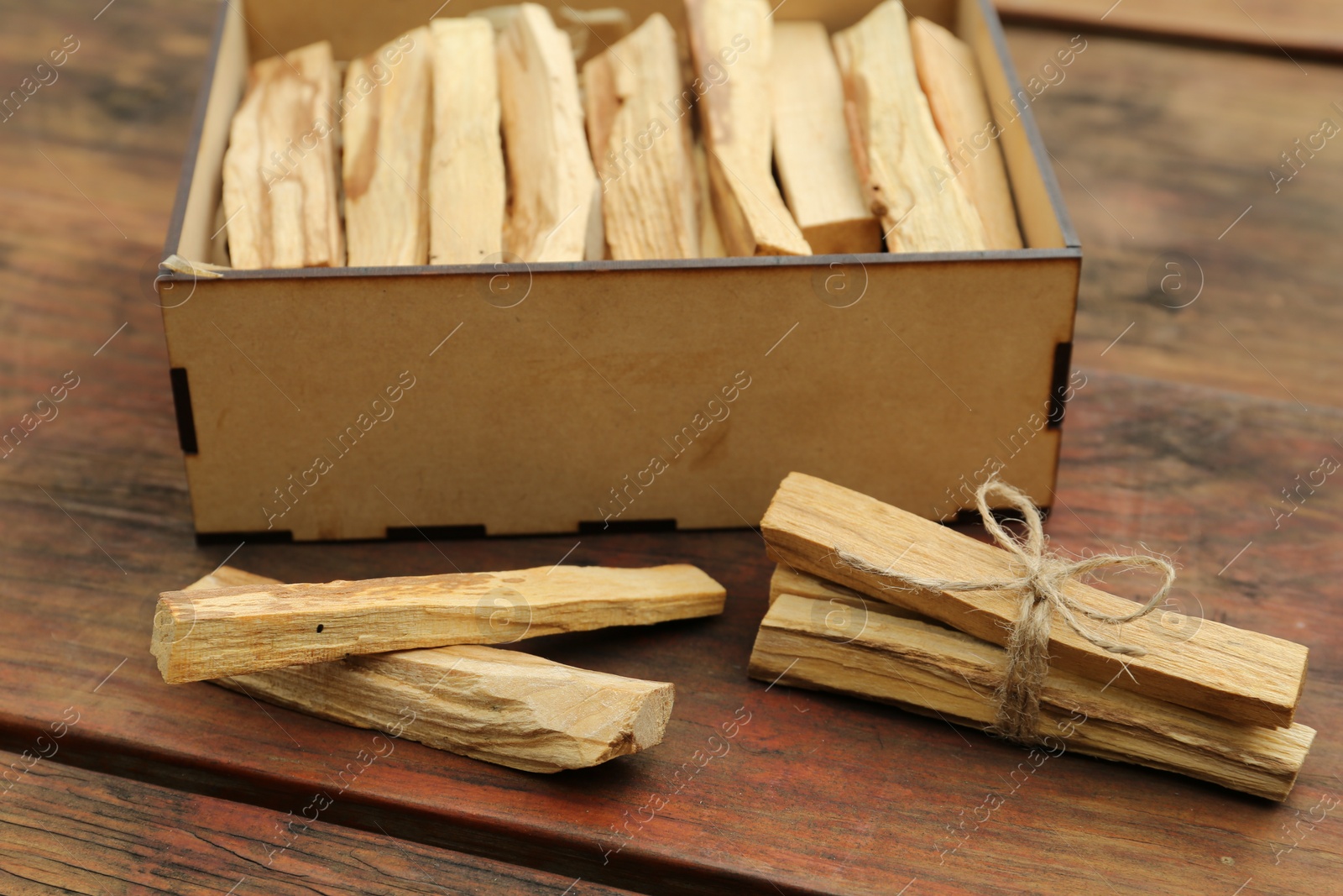 Photo of Palo Santo (holy wood) sticks on wooden table