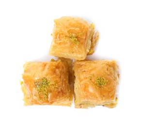 Photo of Delicious baklava with pistachios on white background, top view