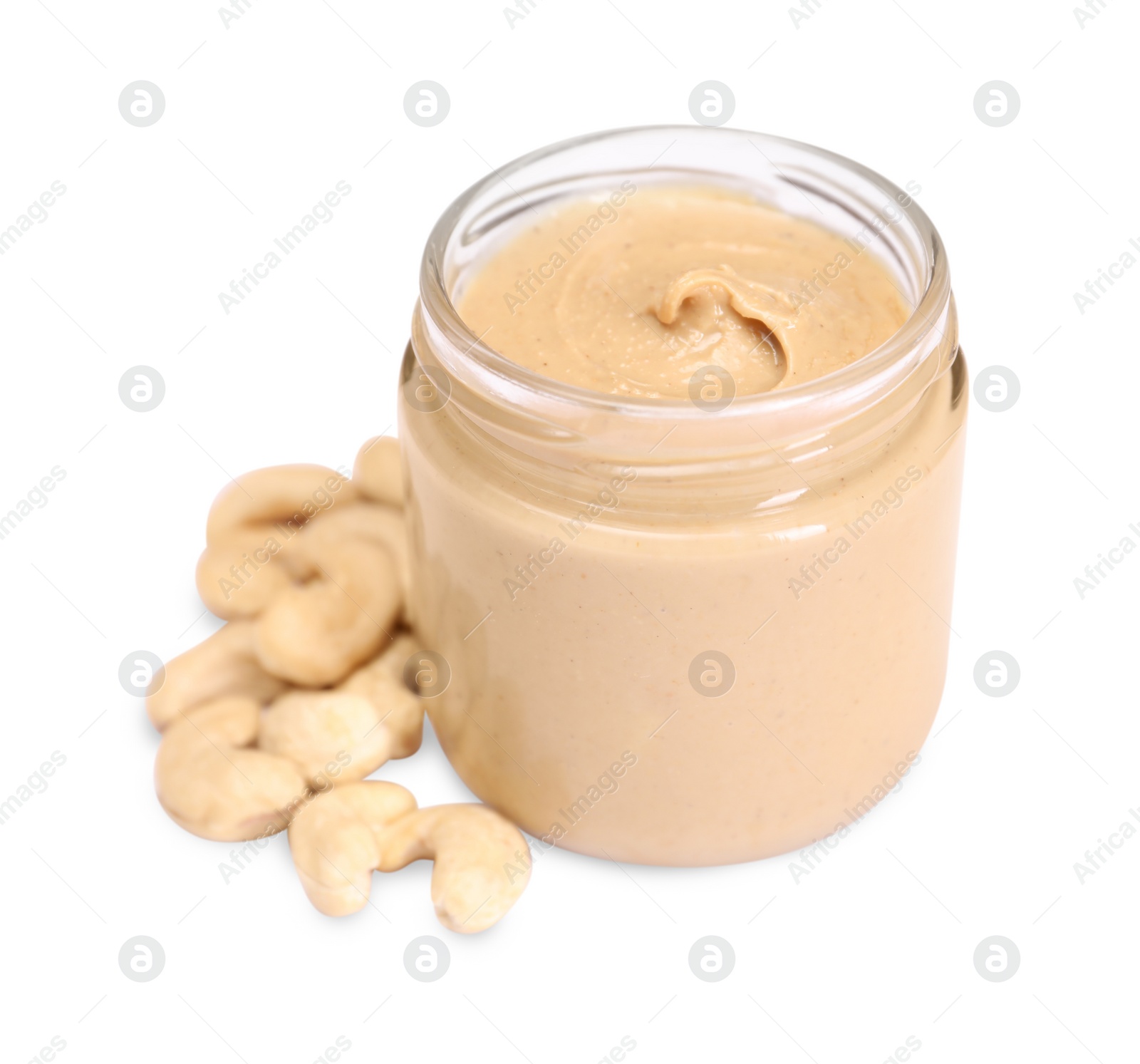 Photo of Tasty nut paste in jar and cashews isolated on white