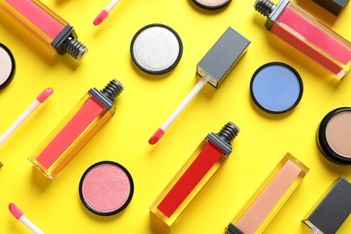 Photo of Composition with lipsticks on color background, flat lay