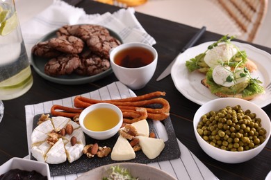 Many different dishes served on buffet table for brunch