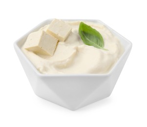 Photo of Delicious tofu sauce and basil leaf in bowl isolated on white
