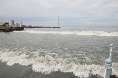 Picturesque view of seacoast on cloudy day