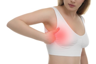 Image of Young woman suffering from breast pain on white background, closeup