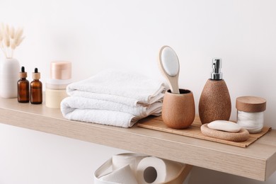 Different bath accessories and personal care products indoors