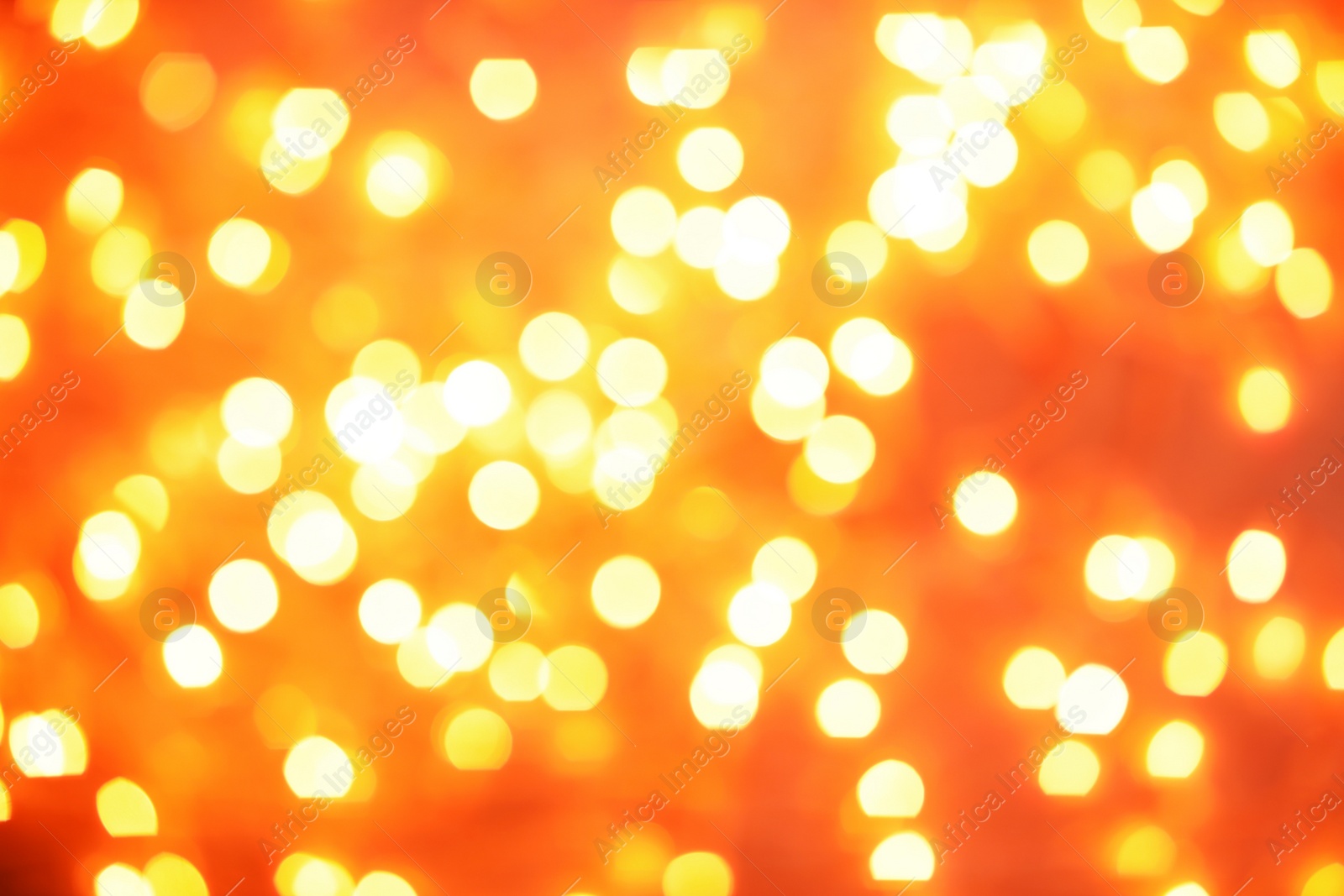 Photo of Beautiful gold lights as background. Bokeh effect