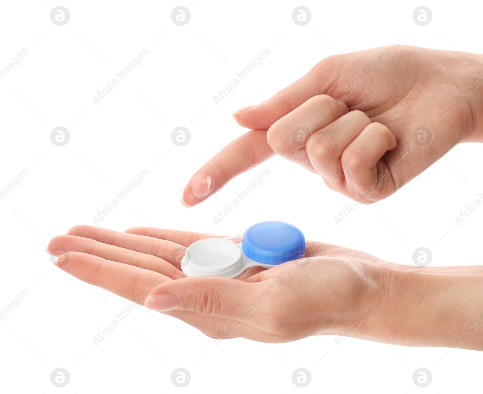 Photo of Woman holding case with contact lenses on white background, closeup
