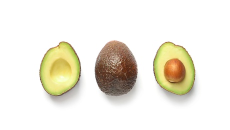 Composition with ripe fresh avocados on white background