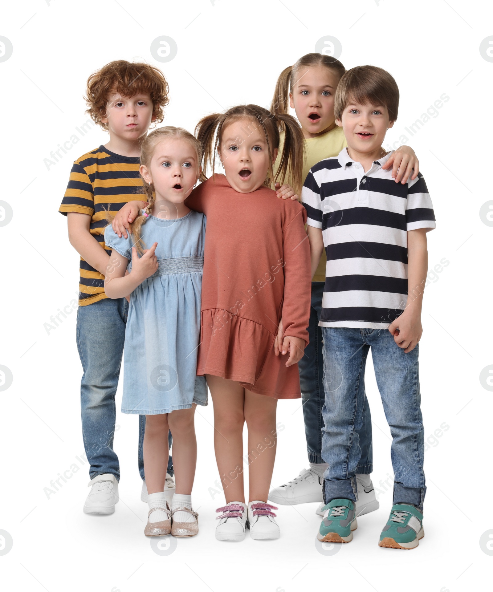 Photo of Full length portrait with group of surprised children on white background