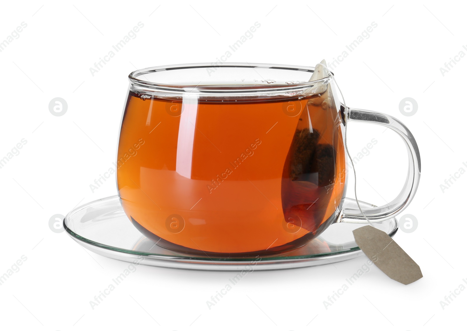 Photo of Brewing aromatic tea. Cup with teabag isolated on white