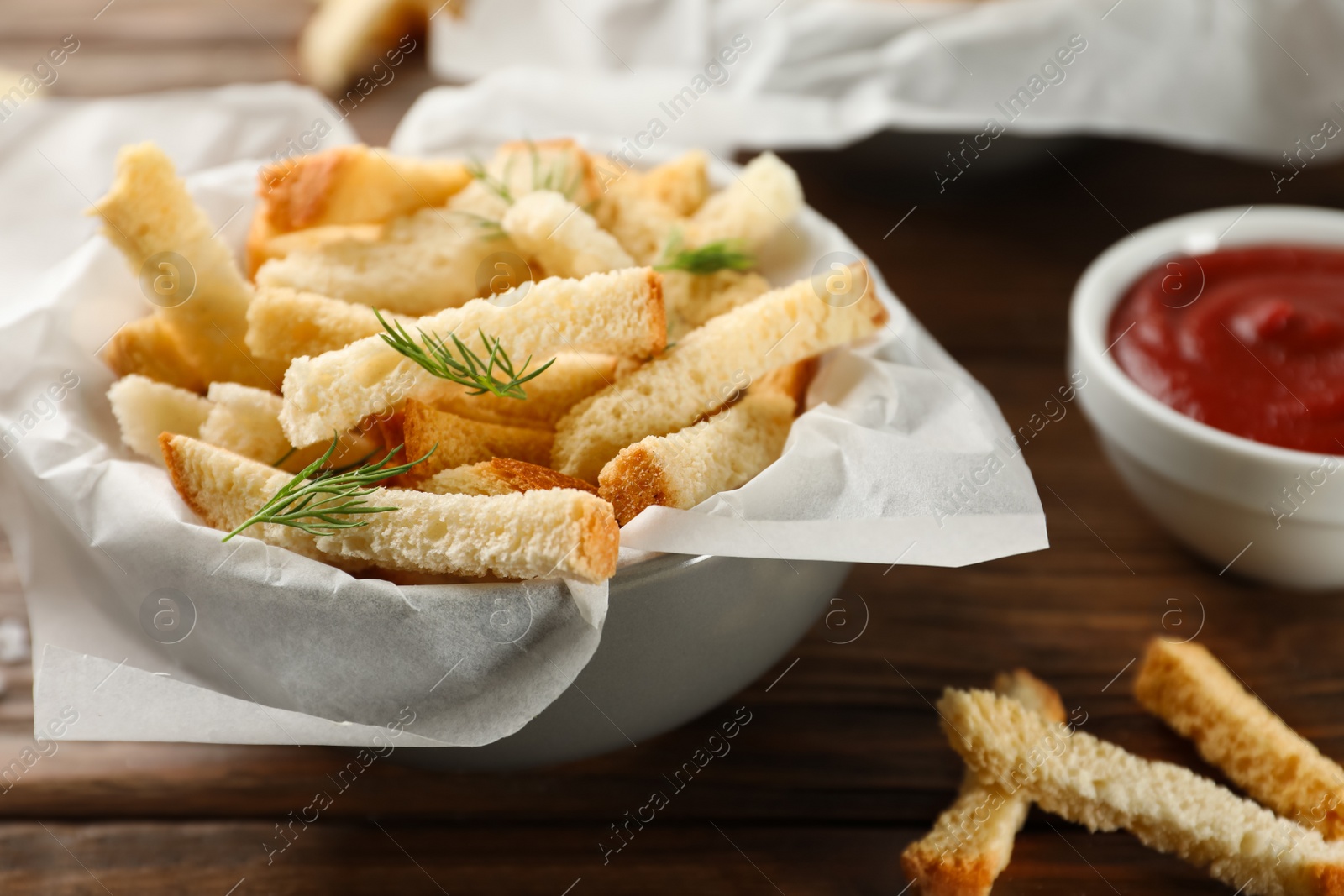 Photo of Delicious hard chucks on wooden table, closeup