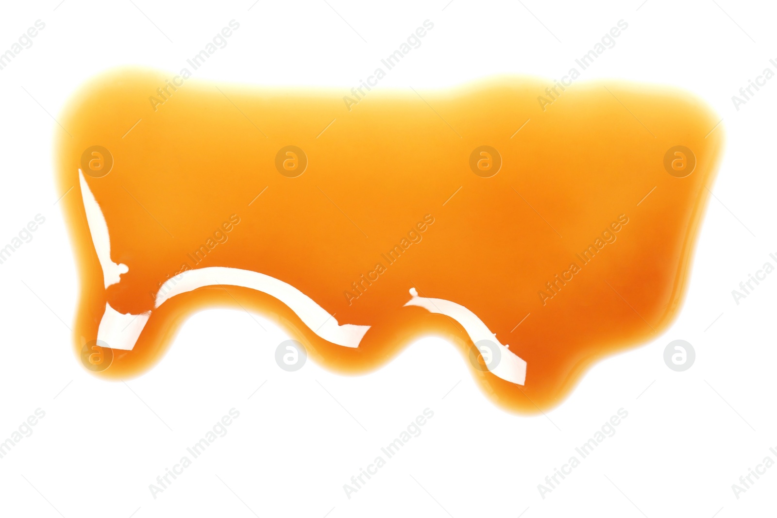 Photo of Delicious caramel sauce on white background