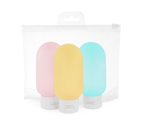 Cosmetic travel kit in plastic bag isolated on white. Bath accessories
