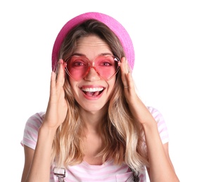 Young beautiful woman wearing heart shaped glasses on white background