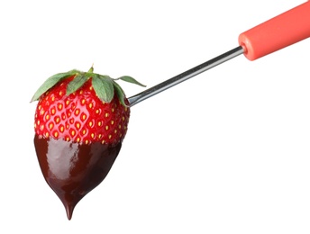 Strawberry with chocolate on fondue fork against white background