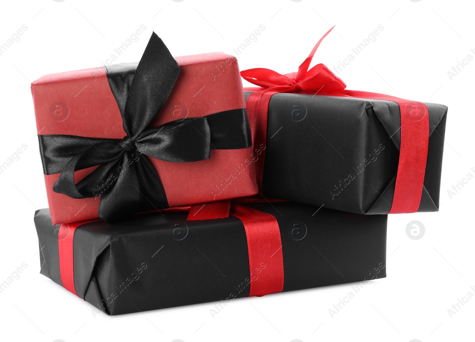 Photo of Gift boxes with bows isolated on white