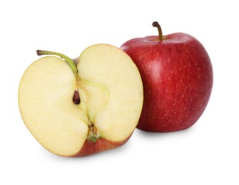 Photo of Whole and cut apples on white background