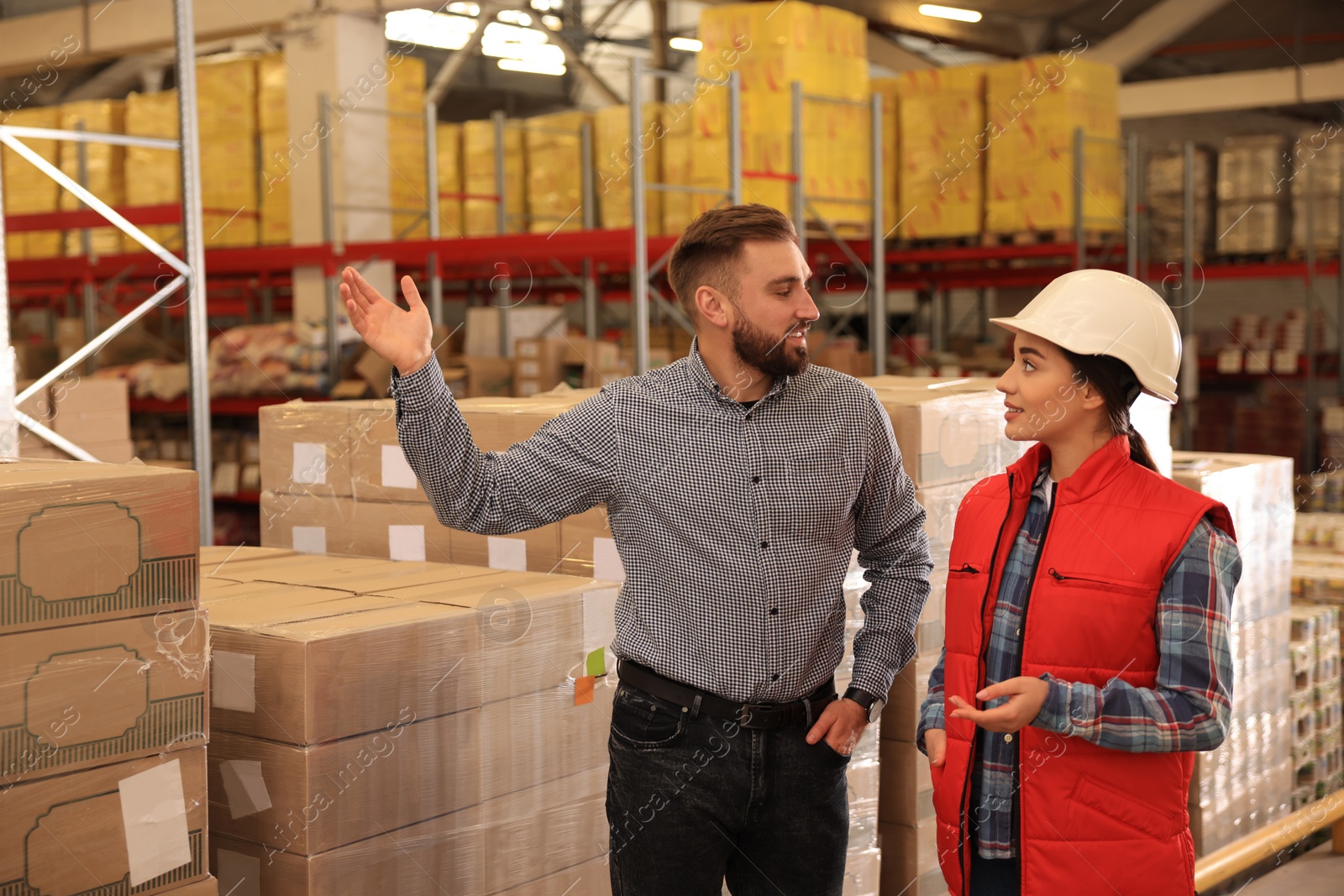 Image of Manager and supervisor at warehouse. Logistics center