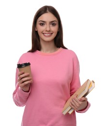 Teenage student holding books and cup of coffee on white background