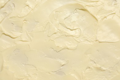 Photo of Texture of fresh natural butter as background, top view