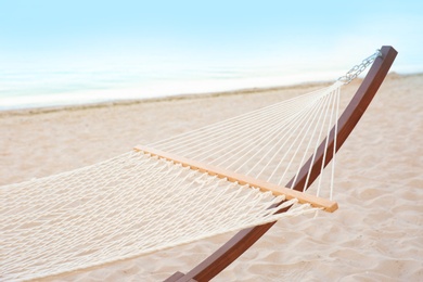 Photo of Empty hammock at seaside. Time to relax