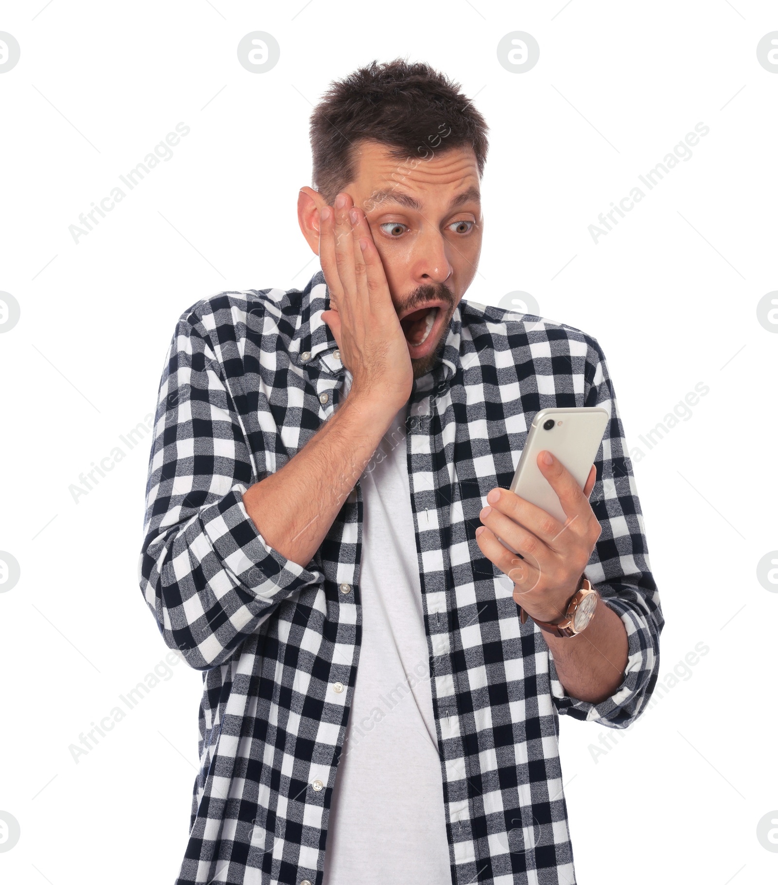 Photo of Emotional man looking at smartphone on white background