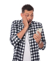 Emotional man looking at smartphone on white background