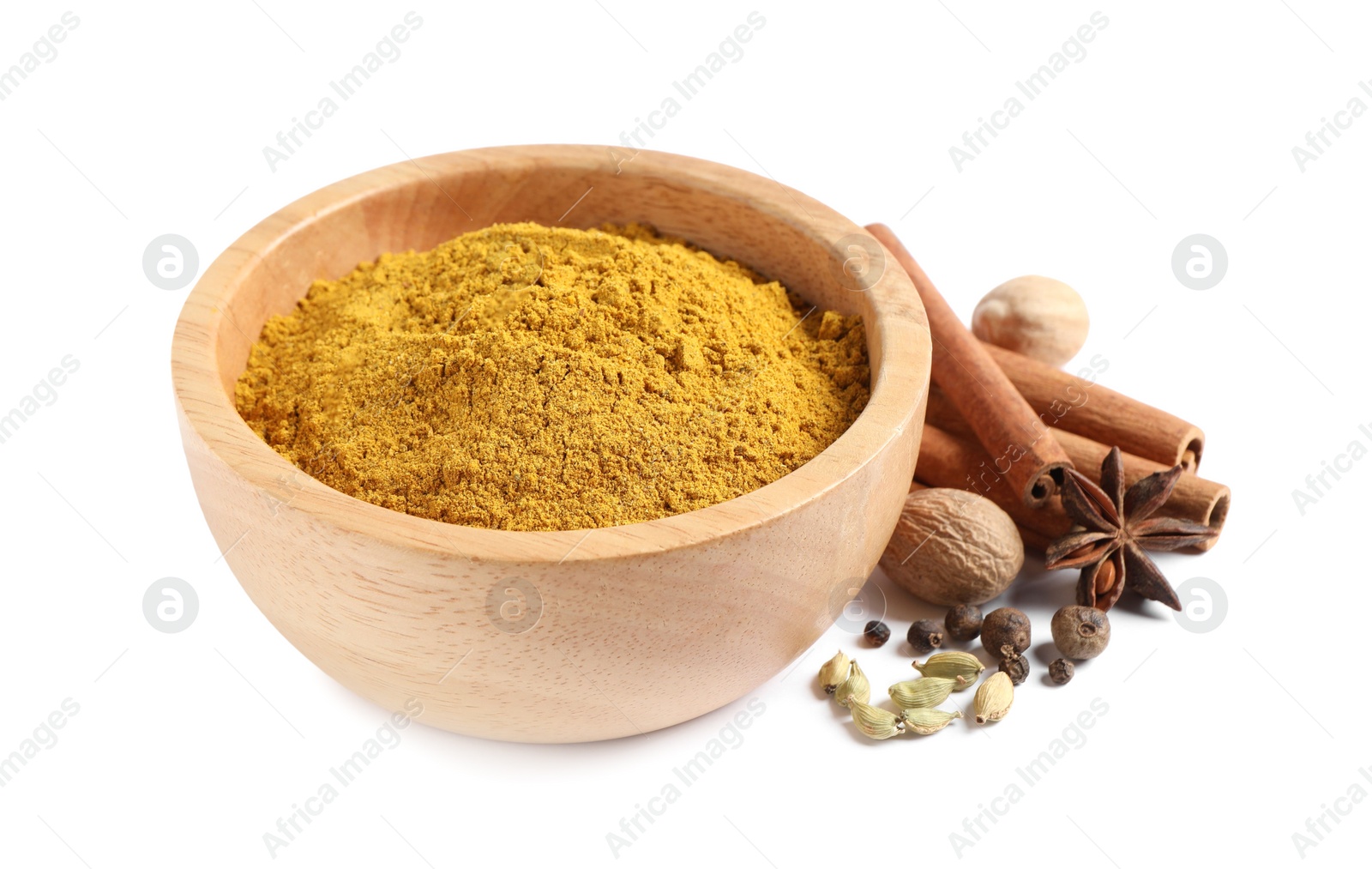 Photo of Dry curry powder in bowl and other spices isolated on white