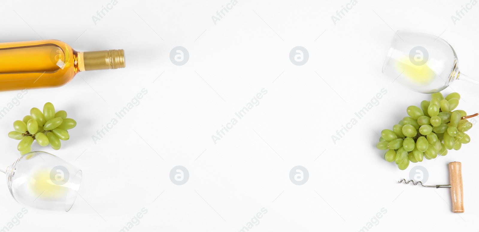 Photo of Composition with wine and grape on white background, top view