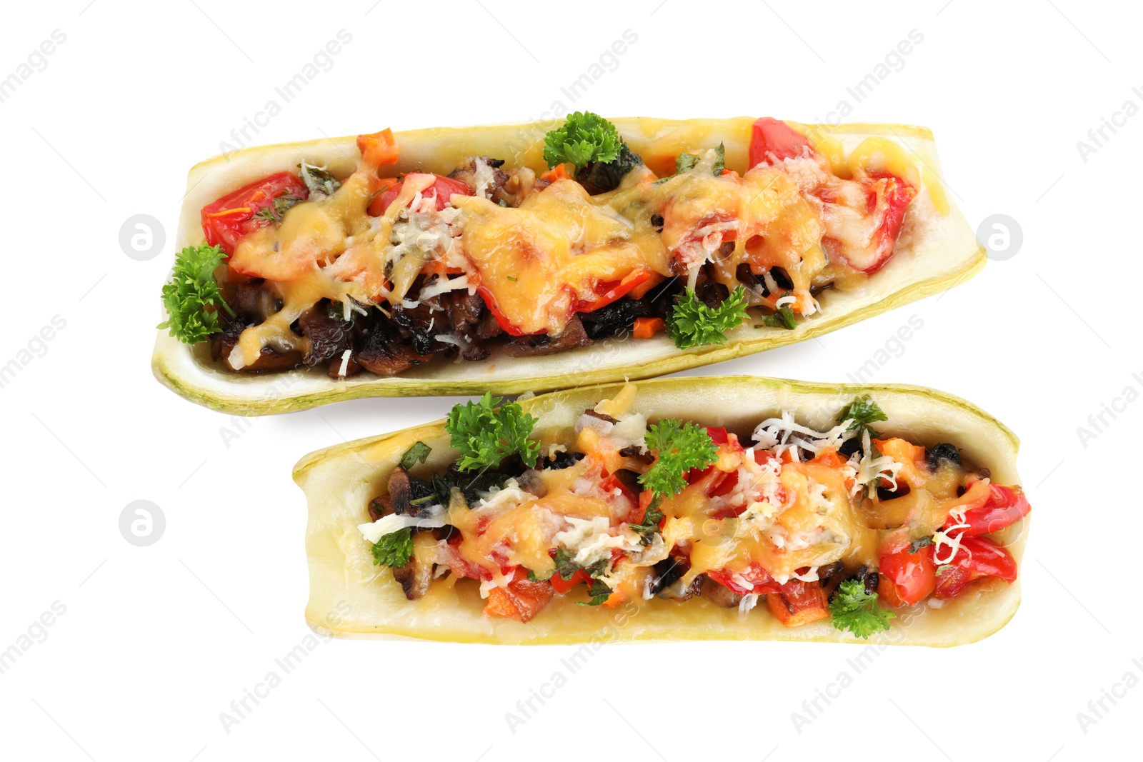 Photo of Delicious baked stuffed zucchini on white background, top view