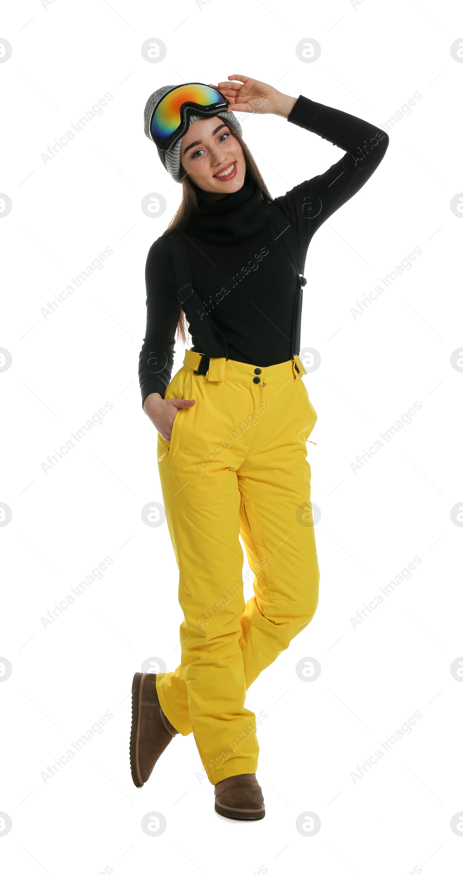 Photo of Woman wearing stylish winter sport clothes on white background