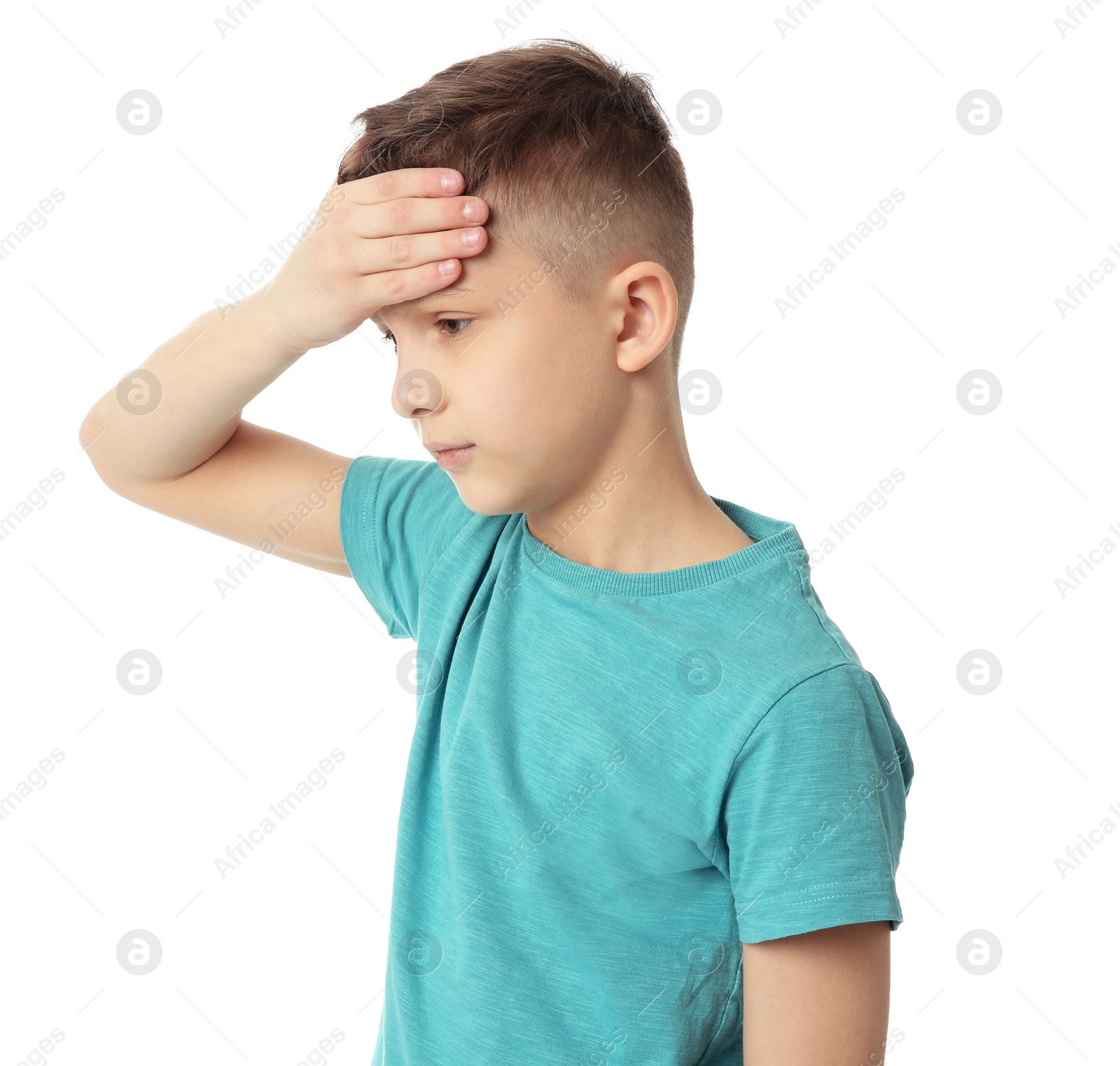 Photo of Little boy suffering from headache on white background