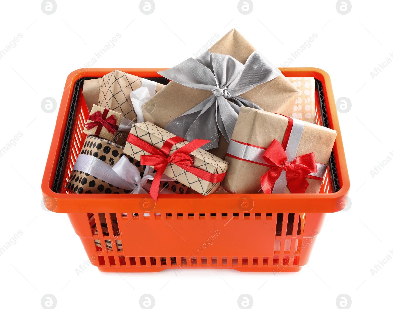 Photo of Orange shopping basket with different gifts on white background