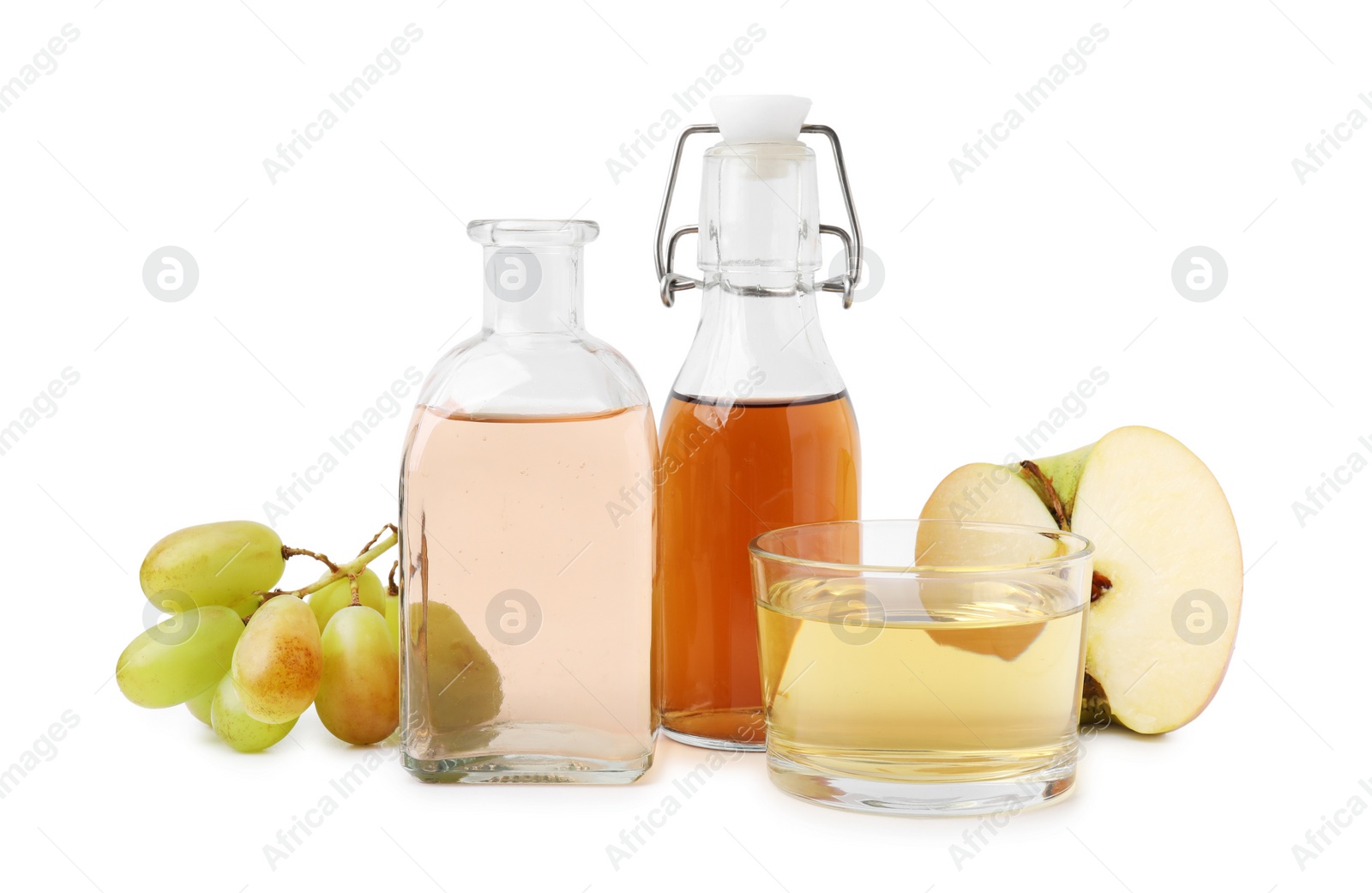 Photo of Different types of vinegar and ingredients isolated on white